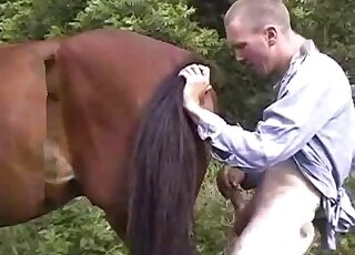 Dude in a sexy shirt is ready to enter this brown mare's hot pussy