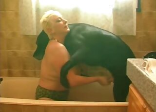 Blonde with natural tits wants to fuck a black animal for the camera