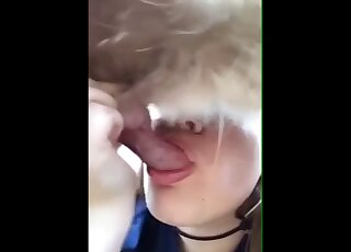Dirty-talking blonde gives this dog a nice close-up blowjob here