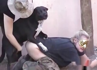 Masked mature takes off pants to get her snatch banged by a dog