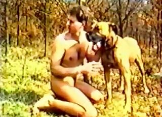 Outdoor video showing a fully naked zoophile guy and his dirty dog